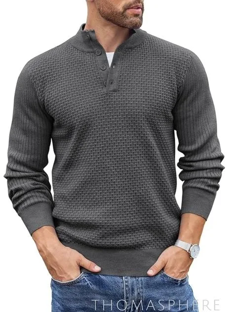 Model wearing a grey textured sweater with a Henley-style neckline and button details, showcasing smart-casual sweater styles for modern fashion.